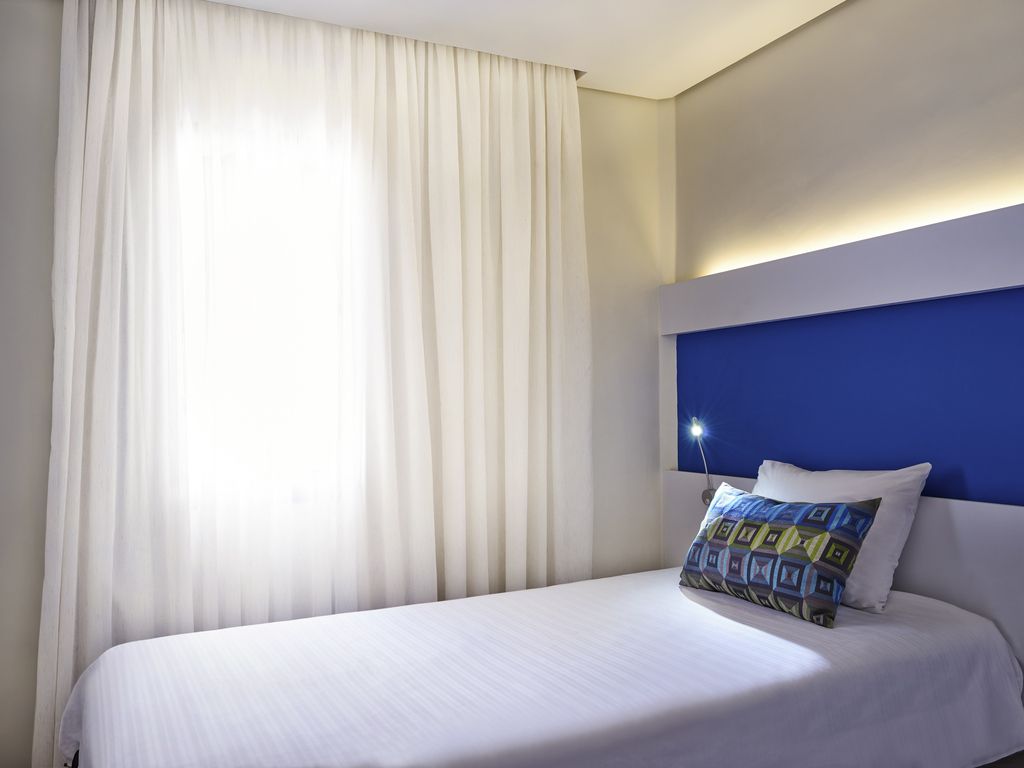 Apartmento superior Premium com 1 cama de casal, uma cama de solteiro e sofá cama