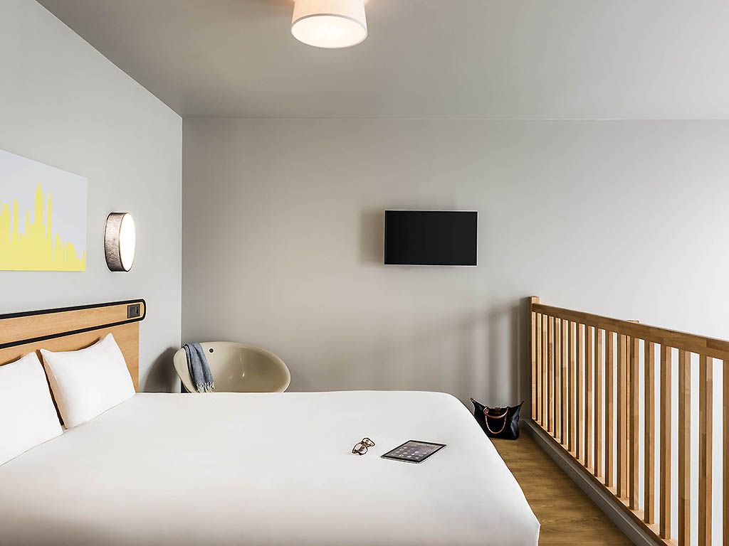 Habitación tipo estudio para 4 personas con una cama doble y entreplanta