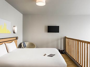 Habitación tipo estudio para 4 personas con una cama doble y entreplanta