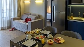 Suite with a double-size bed, sofa bed and equipped kitchen